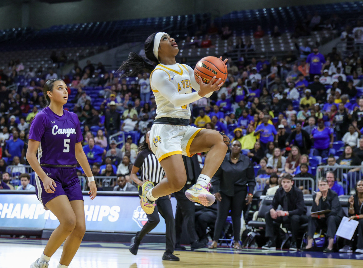 Kiyleyah Parr, the 4A tournament MVP, scores two of her 15 points of La Vega's state title win over Canyon on Saturday.